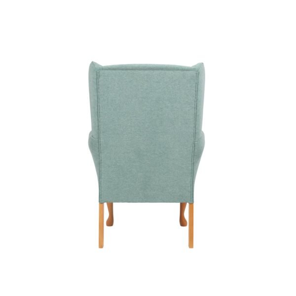 Back view of mint green Queen Anne fireside chair with wooden legs