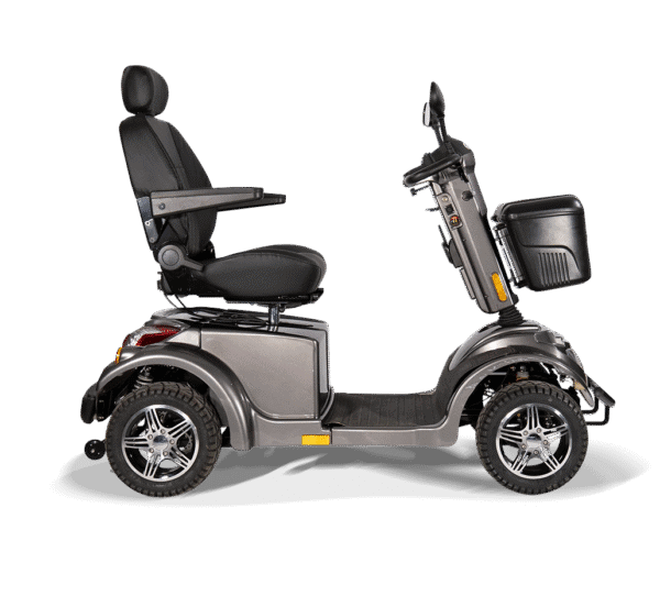 Scooterpac Ignite Mini mobility scooter side profile view showing black seat, silver body, and rugged tires