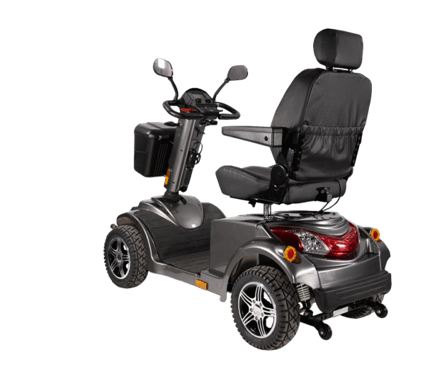 Scooterpac Ignite Mini mobility scooter rear three-quarter view showing suspension, heated seat and rugged tires