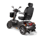 Scooterpac Ignite Mini mobility scooter rear three-quarter view showing heated seat, suspension, and alloy wheels