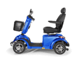 Scooterpac Ignite Mini mobility scooter side view in blue with black seat and front basket