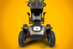 Scooterpac Savvy 8 Plus mobility scooter front view showing headlight, suspension, and rugged tires