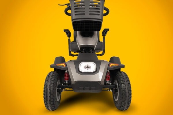 Scooterpac Savvy 8 Plus mobility scooter front view showing headlight, suspension, and rugged tires