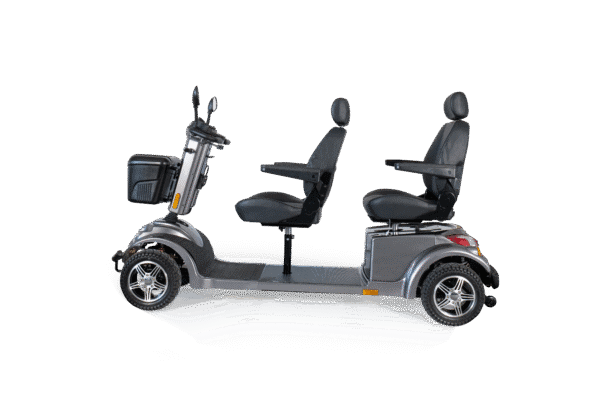 Scooterpac Tandem two-person mobility scooter side view showing dual seats and steering