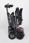 Monarch Genie mobility scooter folded side view showing compact design and wheels