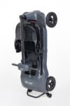 Monarch Genie Ultralight mobility scooter folded side view showing compact design and wheels