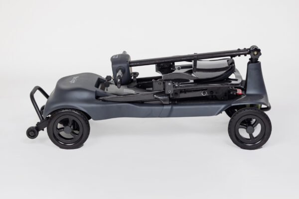 Monarch Genie ultralight mobility scooter folded side view showing compact design and large wheels