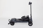 Monarch Genie Ultralight Mobility Scooter side view in dark gray with folding tiller