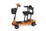 Orange Monarch Genie Ultralight mobility scooter side view with black seat and front basket