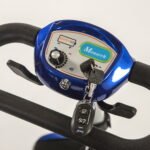 Monarch Smarti mobility scooter control panel detail showing blue dashboard with battery indicator and key fob