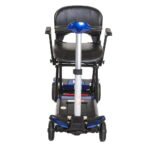 Monarch Smarti folding mobility scooter rear view showing black seat, blue accents, and compact folded frame