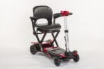 Monarch Smarti red and black automatic folding mobility scooter with padded seat, three-quarter view
