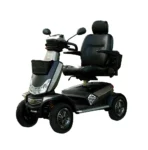 Storm Class 3 mobility scooter in dark gray, three-quarter front view with captain's seat and LED headlights