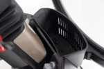 Storm Class 3 mobility scooter front storage basket detail view showing black plastic compartment