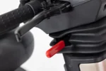 Storm Class 3 mobility scooter detail view showing red safety key and black handlebars