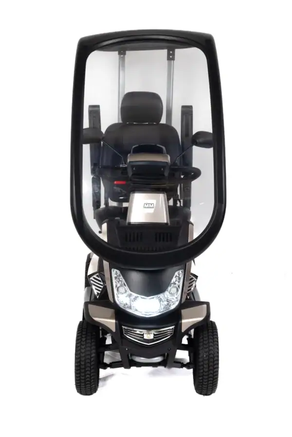 Storm+ Class 3 mobility scooter front view with hard canopy, LED headlights, and black seat