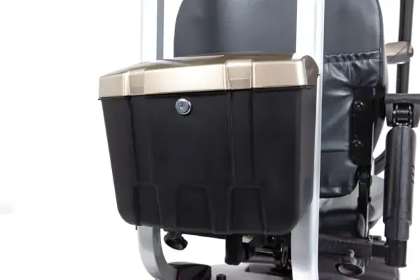 Storm+ mobility scooter rear storage box detail view showing black and tan compartment