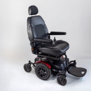 Monarch Super Powerchair in black leather, three-quarter view showing adjustable seat, armrests and footrests