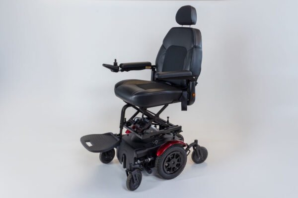 Monarch Super Powerchair in black leather, three-quarter front view showing elevated seat and 6-wheel base