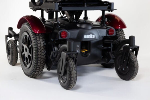 Merits Monarch Super Powerchair rear three-quarter view showing red fenders, robust tires and suspension system