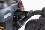 Merits Monarch Super Powerchair rear suspension detail showing shock absorber and red reflector