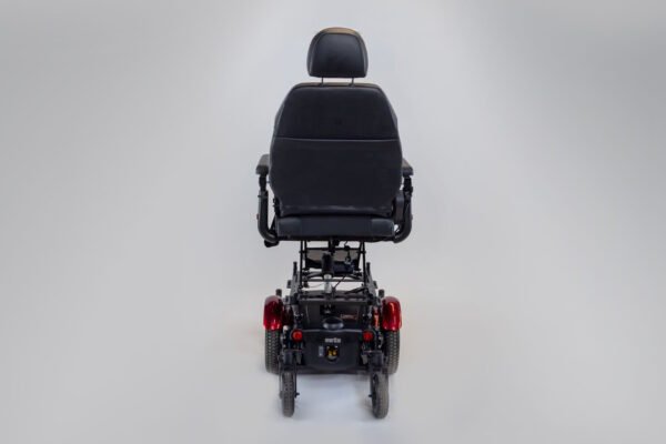 Monarch Super Powerchair rear view showing black seat, red taillights, and sturdy base frame